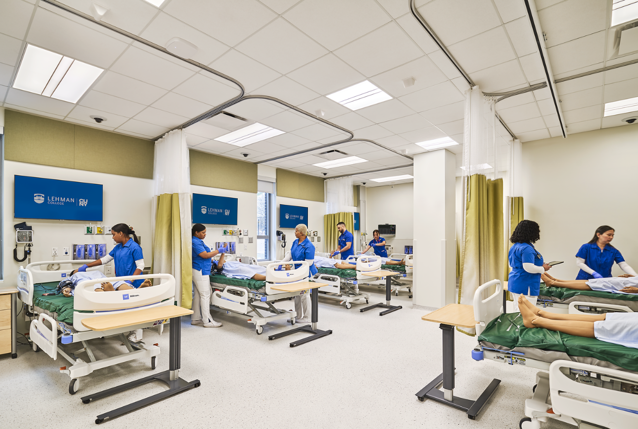 Nursing students practicing patient care in a clinical simulation lab