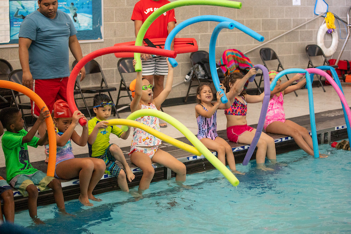 Lehman Summer Camp kids with pool noodles