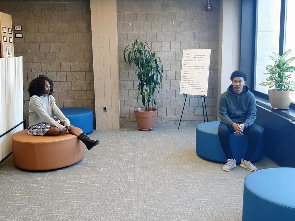 Photo of Lehman Students in Leonard Lief Library