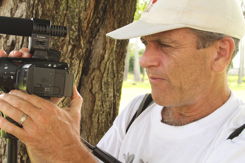 Man holding video camera