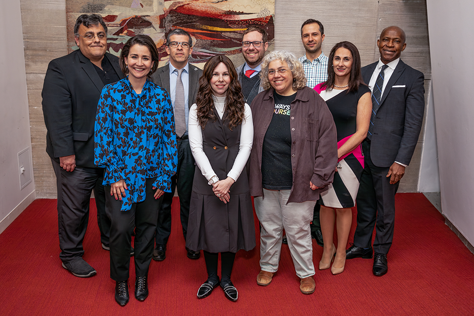 From left to right, President Delgado, Mila Burns, José Gomez-Gonzalez, Michelle Ehrenpreis, John DeLooper, Amanda Gulla, Renato Bettiol, Maria-Isabel Roldós-Prosser, and Provost Nwosu.
