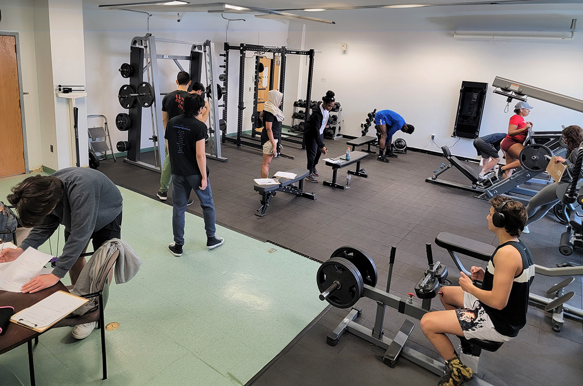 Photo of students exercising at gym