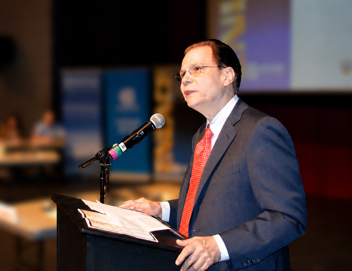 Professor Herminio Martinez in a podium
