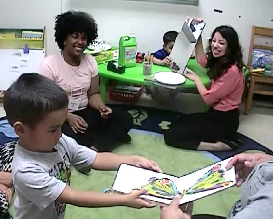 UG and Graduate Student Volunteers support children during Summer Story Time